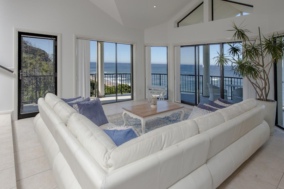 Ground floor living room area at Beach Paradise holiday house Forresters Beach NSW Sydney Australia