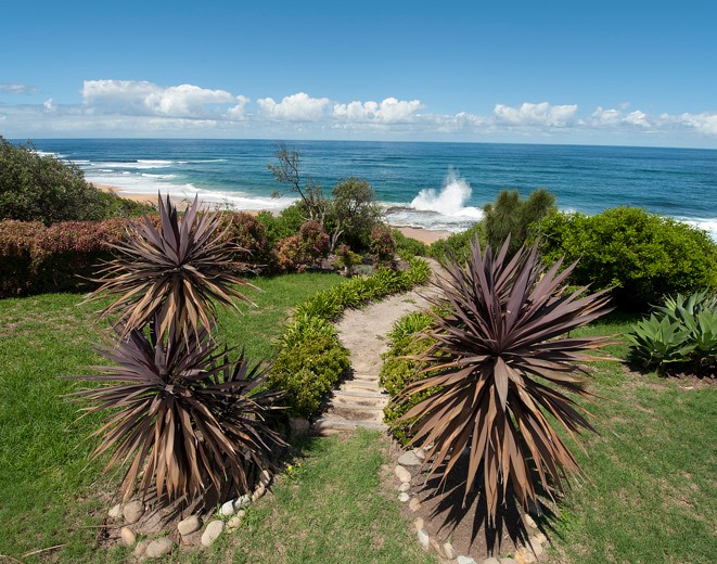 Path to the beach front at the holiday home.